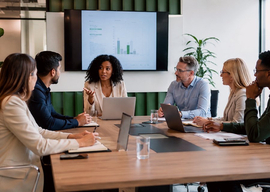 Professional boardroom with people in discussion